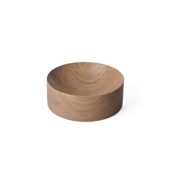 Der Schlüsselsammler ist eine runde, helle Holzschale aus deutscher Eiche, die sich durch ihr glattes, minimalistisches Design auszeichnet - ideal für ein stilvolles Wohnaccessoire.